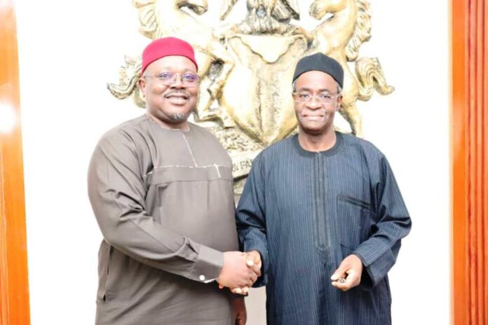 The PS FMSDIGA, Dr. Onwusoro Maduka Ihemelandu in a hand shake with the Director General Budget Office of the Federation Mr Tanimu Yukubu