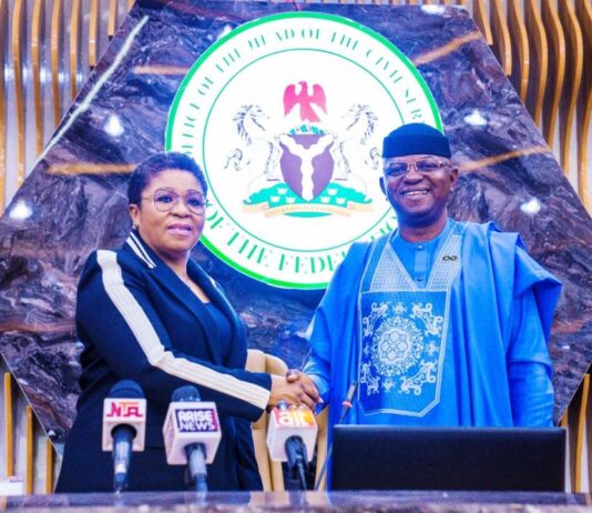 L–R: The Head of the Civil Service of the Federation, Dr. (Mrs.) Didi Esther Walson-Jack, OON, mni, and the Honourable Minister of Water Resources and Sanitation, Engr. Prof. Joseph Terlumun Utsev, FNSE, in a warm handshake during the advocacy visit on Clean Nigeria: Use the Toilet Campaign at the Office of the Head of the Civil Service of the Federation in Abuja on Tuesday, 5th August 2025.