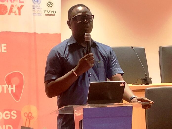 Minister, of Youth Comrade Ayodele Olawande The Honourable Minister, Federal Ministry of Youth Development, Comrade Ayodele Olawande, delivering his remarks at the UN House, Abuja, highlighting the importance of youth engagement, innovation, and active participation in national development.