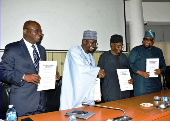 From left; Dr. Lazarus Angbazo, (MD InfraCorp), Dr. Abba Abubakar Aliyu ( MD REA), Mr. Tanimu Yakubu, (DG Budget) Dr. Femi Ogunseinde (Rep. MOFI)