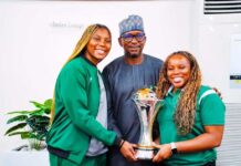 The Chairman National Sports Commission, Mallam Shehu Dikko flanked to the right is the D Tigress Coach, Rena Wakama and to his left, the team Captain, Arny Okonkwo during the presentation of the trophy at the presidential Villa, Abuja recently.