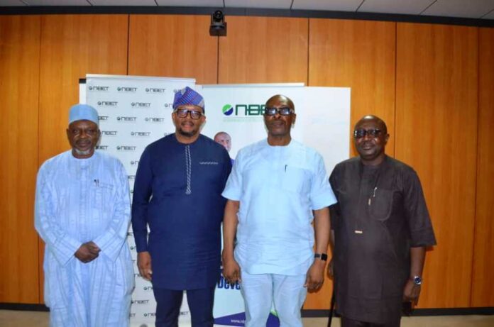 RMAFC Investment Committee L-R: Hon. Commissioner representing Yobe, Hon. Madu Aji Juluri; Managing Director, CEO. NBET Mr. Johnson Akinnawo; Chairman Investment Committee and Commissioner representing Anambra, Hon. Ekene Enefe and the Secretary Investment Committee, Mr. Peter Iyambri, during the visit to the NBET office.