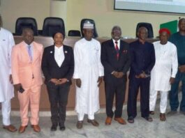 4th from L: Hon. Ismail Mohammed Agaka, Federal Commissioner Kwara State and Rep of RMAFC Chairman; 1st L: Dr. Ahmed Tijjani Ajayi, Rep of DG NSCC; 3rd L: Dr. Mories Atoke, CEO ABC Health amongst others at the Symposium in Dr. M. B. Shehu Auditorium, RMAFC HQ