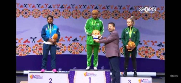 Team Nigeria - Commonwealth Weightlifting Didih Onome Omolola won gold in the women 53kg category at the Commonwealth Weightlifting Championship in India.