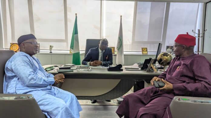 courtesy visit to BPP Director-General, Bureau of Public Procurement (BPP), Dr. Adebowale A. Adedokun, FCIPS, ACFE, discussing with the COREN President (L) Engr. Prof Sadiq Z. Abubakar, FNSE, FAEng, and COREN Registrar (R) Engr. Prof O.A.U Uche, FNSE at the DGs office during a courtesy visit to BPP