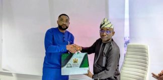 Director-General, Bureau of Public Procurement (BPP), Dr. Adebowale A. Adedokun, FCIPS, ACFE, right, exchanging pleasantries and souvenir with the CEO Equipment Leasing Registration Authority, Donald Wokoma, left, after a presentation on the Implementation of Ministry of Finance Circular on Leasing in Public Procurement