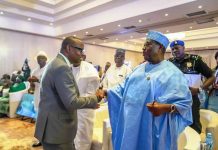 @ The First National Stakeholders' Dialogue on Power In The Health Sector held at the Abuja Continental Hotel. The Secretary to the Government of the Federation Senator George Akume CON, (representing President Bola Ahmed Tinubu GCFR) in a warm handshake with the Honourable Minister of Health & Social Welfare Dr. Iziaq Adekunle Salako