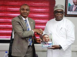 Director-General MCO, Engr. Obadiah Simon Nkom graciously receives a commemorative magazine gift from Ag. Zonal Director EFCC, Asst. Commander Micheal Wetkas during a courtesy visit on Wednesday 3rd September 2025 held at EFCC Zonal Command Office Wuse 2 Abuja.