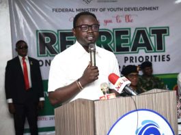 Honourable Minister of Youth Development, Comrade Ayodele Olawande, delivering his address at the Presidential Priorities and Deliverables Retreat in Abuja.