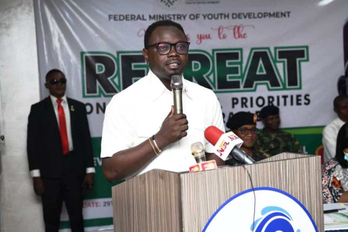 Honourable Minister of Youth Development, Comrade Ayodele Olawande, delivering his address at the Presidential Priorities and Deliverables Retreat in Abuja.