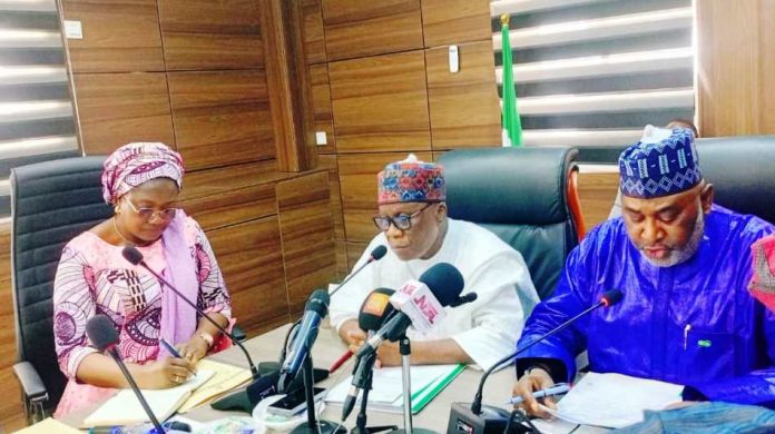 The Minister of Regional Development, Engr. Abubakar Momoh, ( Centre) delivering his address during a Retreat organized by the Ministry of Regional Development and the Development Commissions, anchored by the Bureau of Public Procurement (BPP) on 8th September, 2025, at the Minister's Conference Room, Federal Secretariat Phase 1, Abuja. Hon. Minister of State, Regional Development (MRD), H.E. Uba Maigari Ahmadu is on the right, while the Permanent Secretary Dr. Mary Ada Ogbe is on the left.