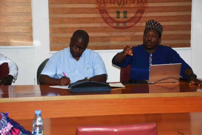 SERVICOM Management team World Bank Project Coordinator, Mr Siakpere and his team briefing a Cross section of SERVICOM Management team
