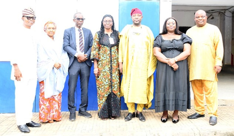 3rd from Right : Representative of the Surveyor General of the Federation and others in a group photograpgh after the successful signing of MOU between OSGOF and NACHRED