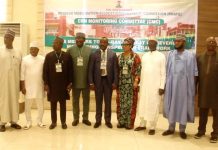 Inset; Chairman of the Committe and Representative of RMAFC Chairman Engr. Nduka Henry Awuregu,4th left; Vice Chairman of the Committee; Prof Steve Ugba, 4th right: Hon. Nkech Linda Otti, 3rd left; Hon. Victor Eboigbe, 3rd right Hon. Adamu Panda, 2nd right; Secretary to the Commission, Nwaze Joseph Okechukwu, 1st left; Secretary to the Committee Dr. Tanimu Adamu Aliyu and the resource persons at the occasion