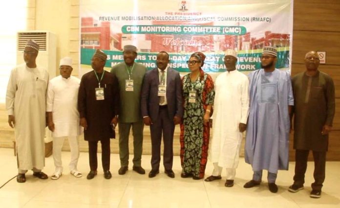 Inset; Chairman of the Committe and Representative of RMAFC Chairman Engr. Nduka Henry Awuregu,4th left; Vice Chairman of the Committee; Prof Steve Ugba, 4th right: Hon. Nkech Linda Otti, 3rd left; Hon. Victor Eboigbe, 3rd right Hon. Adamu Panda, 2nd right; Secretary to the Commission, Nwaze Joseph Okechukwu, 1st left; Secretary to the Committee Dr. Tanimu Adamu Aliyu and the resource persons at the occasion