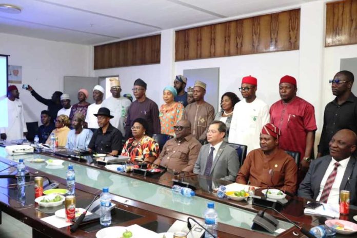 A group photograph of the 3rd quarter Stakeholders Engagement of FMSDIGA with the PS, Dr Onwusoro Maduka Ihemelandu 4th from the right & His Excellency MERSOLE J. MELLEJOR Ambassador, Philippine Embassy Abuja, Nigeria Permanent Representative to ECOWAS, 3rd from the Right with other dignitaries