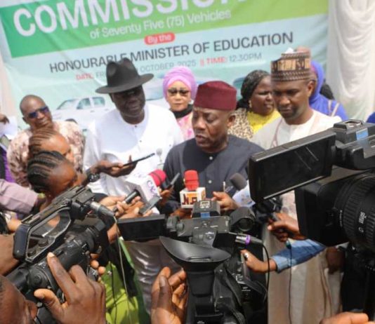 Honourable Minister of Education Addressing the Press During the Commissioning of Operational 75 Vehicles for the Ministry