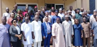Representative of the Director-General, Bureau of Public Procurement (BPP) and Director, Civil Infrastructure Department (CID), BPP, Engr. Nasir M. Bello 5th right, Director-General, Bureau of Public Service Reforms (BPRS), Dr. Dasuki Ibrahim Arabi 7th left, Engr. Isaiah Yesufu 6th left, Director, Compliance, Certification and Monitoring Department (CCM), some management staff of the Bureau and Participants in a group photograph during Bureau's Three-Day Refresher Training/Workshop for Procurement Officers of SGL 14-16 in the Pool of the BPP in Abuja