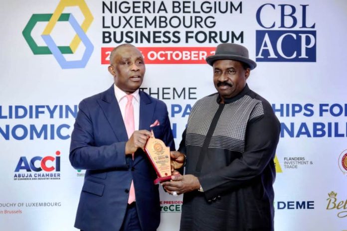 Capt. Chris Najomo and Mr. Colins Nweke R-L DG . Nigeria Civil Aviation Authority (NCAA), Capt. Chris Najomo and Mr. Colins Nweke, Organizer, Nigeria Belgium Luxembourg Business Forum.