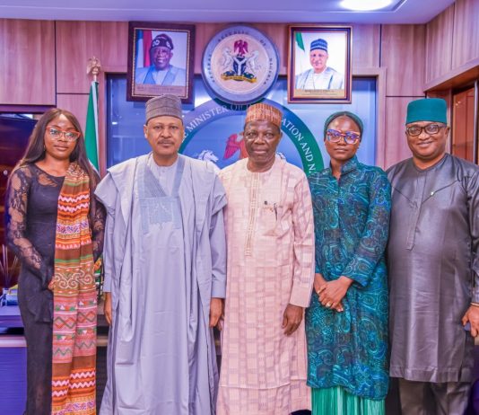 Honourable Minister of Information and National Orientation, Mohammed Idris (2nd left), in a group photograph with representatives of the Abdullahi Omaki Community Peace Initiatives Network during a courtesy visit to the Ministry in Abuja on October 8, 2025. With him are Amb. Abdullahi A. Omaki, EVC/Founder, Abdullahi Omaki Community Peace Initiatives Network (3rd left); Sir Bola Abimbola, Member, Board of Trustees (1st right); Mrs. Panritmwa Haryy-Odoh, Programme Officer (2nd right); and Patience Ikoro, Executive Assistant (1st left).