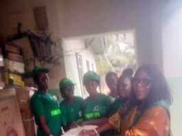 Dr. Perpetual Iyare, Representative of the HM. FMAFS Presenting the Items to One of the Cooperative Groups.