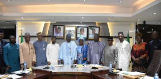 The Permanent Secretary,FMAFS, Dr Marcus Ogunbiyi (C), with the technical committee members during the inauguration ceremony in Abuja.