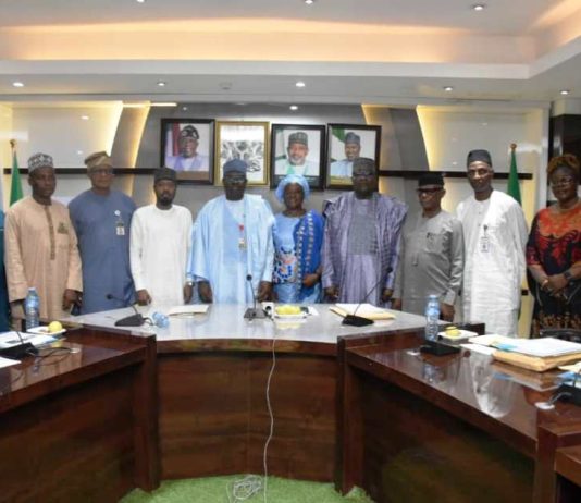 The Permanent Secretary,FMAFS, Dr Marcus Ogunbiyi (C), with the technical committee members during the inauguration ceremony in Abuja.