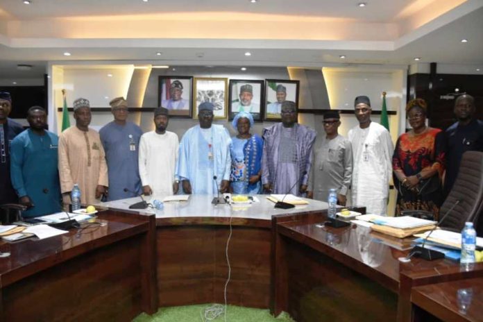 FMAFS, Dr Marcus Ogunbiyi The Permanent Secretary,FMAFS, Dr Marcus Ogunbiyi (C), with the technical committee members during the inauguration ceremony in Abuja.