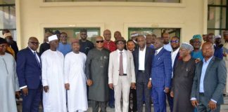 Middle RMAFC Chairman, Dr. Mohammed Bello Shehu OFR, Coordinating Director FIRS Mr. Shettima Tamadi, Secretary to the Commission, Nwaze Joseph Okechukwu, other officials from RMAFC, FIRS and the engaged consultants in a