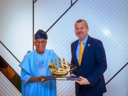 Minister of Marine and Blue Economy, Mr. Adegboyega Oyetola, CON, presenting a souvenir to the Secretary-General of the International Maritime Organization (IMO), Mr. Arsenio Domínguez, during the IMO Secretary-General’s visit to Nigeria, on Thursday.