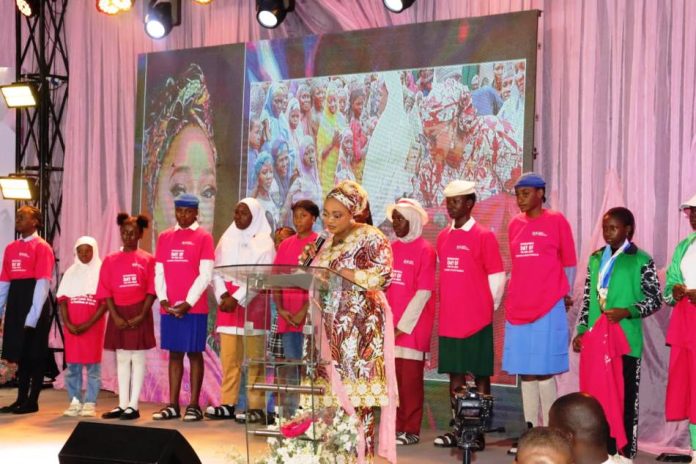 The Honourable Minister of Women's Affairs and Social Development, Imaan Suleiman brahim fsi, presents her keynote Address to flag - off the 2025 International Day of the Girl-Child Celebration at the Dr. Maryam Babangida National Centre for Women Development, Abuja