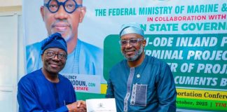 The Permanent Secretary, Federal Ministry of Marine and BlueEconomy, Olufemi Oloruntola, (l) receiving the title document for 130 hectares of land for construction of Inland Dry Port in Ijebu Ode from the Ogun State Commissioner of Transportation, Engr. Gbenga Dairo.