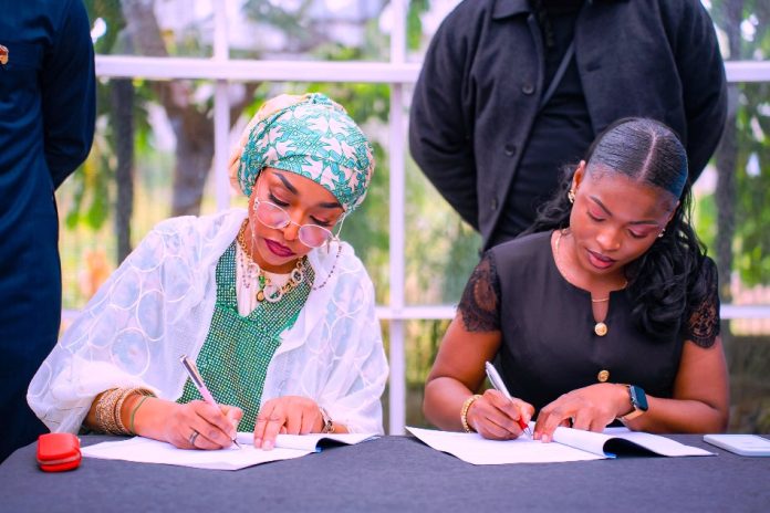 Minister of Art, Hannatu Musa Musawa The Minister of Art, Culture, Tourism and Creative Economy, Hannatu Musa Musawa, and Julia Azubuike, Program Director of Lens for Good Initiative, sign Strategic MoU with Lens for Good Initiative to empower Nigerian creatives through innovation, storytelling, and skill development. October 20th, 2025, Abuja, Nigeria.