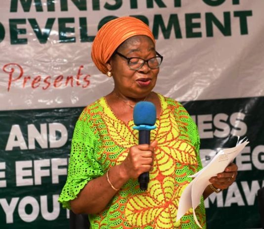 Representative of the Honourable Minister of Youth Development and Director, Youth Migration and Climate Change Action, Mrs. Leleh Grace, giving her remarks at the event.