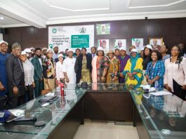 GROUP PICTURE: Middle: The Permanent Secretary Daju Kachollom mni, representing both the Honourable Coordinating Minister and Honourable Minister of State for Health and Social Welfare; On her Left: Dr. Binyerem Ukaire Director Family Health Department FMoHSW; On her Right: Dr. Orji, Chairman Local Organising Committee; Supported by Directors of FMOHSW; and Development Partners.