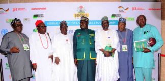 The Minister of State for Agriculture and Food Security, Sen Dr Aliyu Sabi Abdullahi (C), and other stakeholders during the launching of the Nigerian Farmers Soil Health Scheme.