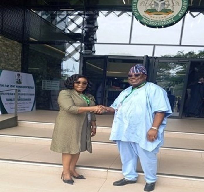 OHCSF and FCSC Joint Retreat Hon. Chairman, Federal Civil Service Commission (FCSC), Prof. Tunji Olaopa (right) with the Head of the Civil Service of the Federation (HCSF), Mrs. Didi Esther Walson-Jack at the maiden one-day joint retreat at the Office of the National Security Adviser Complex, Abuja.