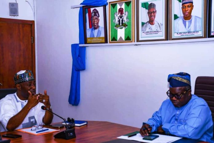 OSGOF To Support NIWRMC L-R : Executive Director of NIWRC Abdulmumin Mohammed Zaria and Surveyor General of the Federation Abdulganiyu Adebomehin Adeyemi during the meeting