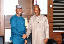 Minister’s Aide Congratulates PR Director on Service Delivery Award