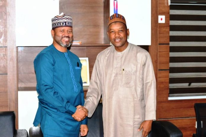 Minister’s Aide Congratulates PR Director on Service Delivery Award