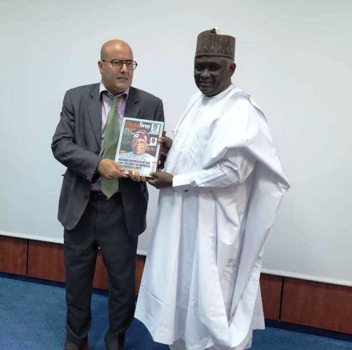PRESENTING A SOUVENIR NTAC DG, RT. HON. YUSUF BUBA YAKUB PRESENTING A SOUVENIR TO THE REPRESENTATIVE OF THE TUNISIAN MINISTER OF CULTURE.