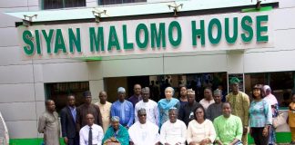 The Executive Director, NIWRMC, Dr. Abdulmumini Aminu Zaria (3rd L) and The Director General, NGSA, Professor Olusegun Omoniyi Ige (3rd R) with staff of both organisations in a group picture in Abuja