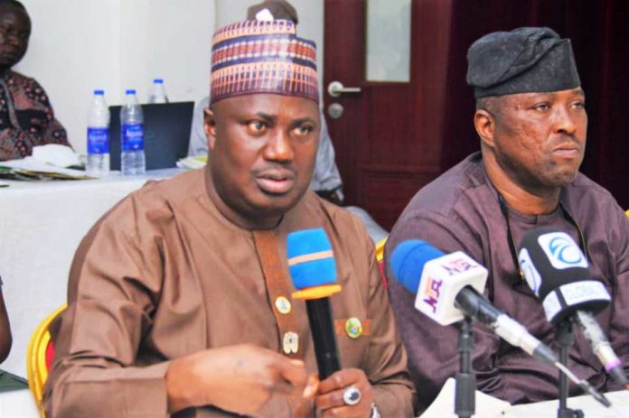 Sen Dr Aliyu Sabi Abdullahi and Mr Oshadiya Olanipekun L-R, the Minister of State for Agriculture and Food Security, Sen Dr Aliyu Sabi Abdullahi and Director, Agricultural Land and Climate Change Management Services Department, Mr Oshadiya Olanipekun during the workshop in Abuja.