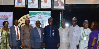 Permanent Secretary, Dr Shuaib Belgore in a group picture with Inaugurated Members of the Departmental Award Selection Committee of the Federal Ministry of Housing and Urban Development.