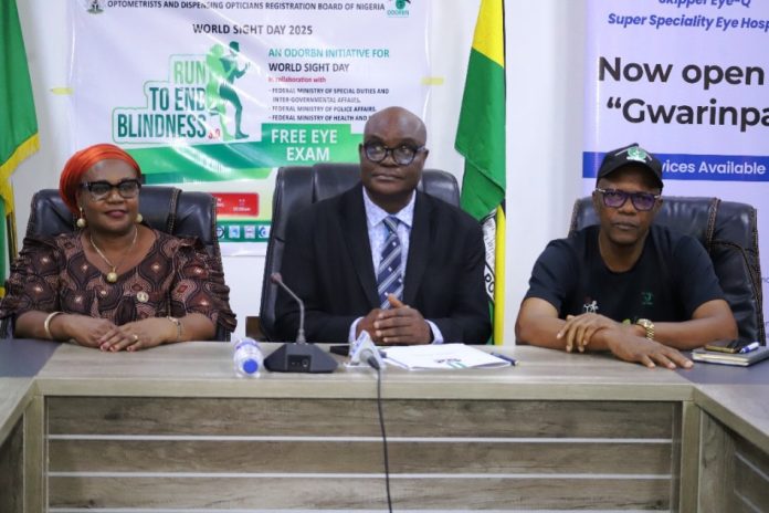 free eye tests and glasses to the staff Permanent Secretary, Ministry of Police Affairs, Dr. Anuma Ogbonnaya Nlia and Deputy Registrar, Optometrists and Dispensing Opticians Registration Board (ODORBN), Dr. Igbo Okafor, during the flag-off of the free eye tests and glasses to the staff of the Ministry of Police Affairs, Nigeria Police Trust Fund (NPTF), and Nigeria Police Force (NPF) organised by the Optometrists and Dispensing Opticians Registration Board (ODORBN) in conjunction with the Federal Ministries of Health and Police Affairs held at the Headquarters of the Ministry, Federal Secretariat, Abuja.
