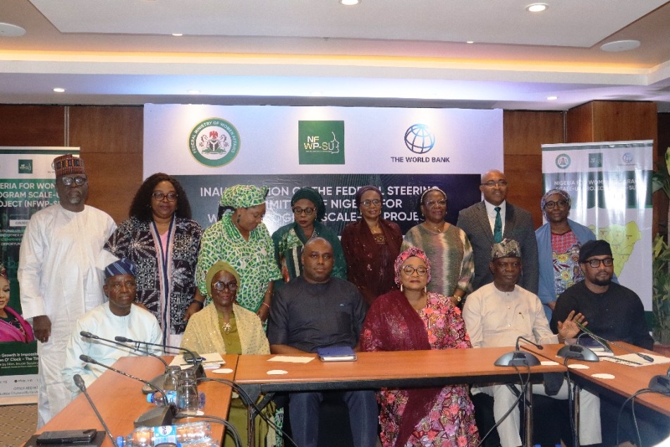 The Honourable Minister of Women Affairs and Social Development, Hon. Imaan Suleiman Ibrahim, fsi, the Permanent Secretary of the Ministry, Dr. Maryam Ismaila Keshinron, the Representative of the Country Director of World Bank and other dignitaries in a group photograph during the event held today, at Transcorp Hilton, Abuja