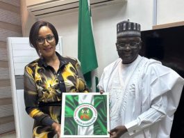 The Minister of State for Foreign Affairs, Amb. Bianca Odumegwu-Ojukwu (Left) and the Director-General, Nigerian Technical Aid Corps, Rt. Hon. Yusuf Buba Yakub, pose for a photo session after a working visit by the DG to the Ministry Headquarters in Abuja on *Friday, October 10, 2025. The NTAC DG here presenting to the Hon. Minister, paraphernalia of his stewardship at the Nigerian Technical Aid Corps in the last two years.