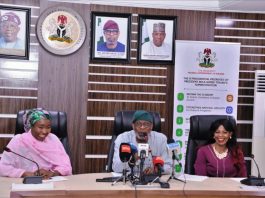 From R-L is the Executive Secretary of the Solid Minerals Development Fund, Fatima Shinkafi, next to her is the Honourable Minister of Solid Minerals Development Dr. Dele Alake, next to him is the President of Women in Mining in Nigeria Mrs. Janet Adeyemi during the pre-event press briefing in preparation for the upcoming African Gems and Jewellery Exhibition . The briefing was held on the 18th November, 2025 in the the Honourable Minister's Conference Room, Abuja.