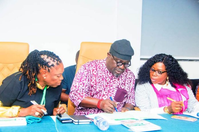 2nd National Council On Sports Director-General, National Sports Commission, Hon. Bukola Olopade (middle) in a tete-a-tete with the Deputy Director of PRS, Mrs. Odiaka Olufisayo (right) and the Commissioner for Sports Development, Cross River State, Hon. Agnes Atsu during the day 1 of National Council on Sports ongoing in Calabar the Cross River State capital