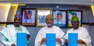 L-R, the Director General, NASRDA, Dr Mathew Adepoju, Minister of Agriculture and Food Security, Sen Abubakar Kyari and Permanent Secretary, Dr Marcus Ogunbiyi during the Signing of Memorandum of Understanding.